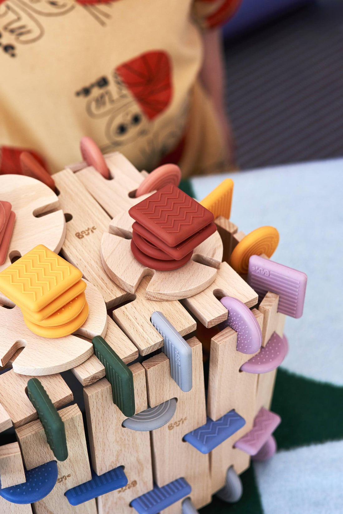 Detailed desk sculpture built from BAVVIC beechwood blocks and muted silicone connectors
